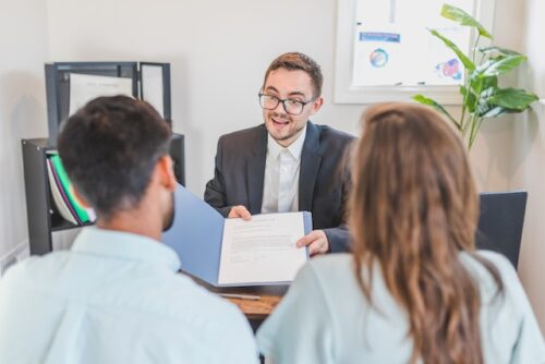 couple meeting with attorney