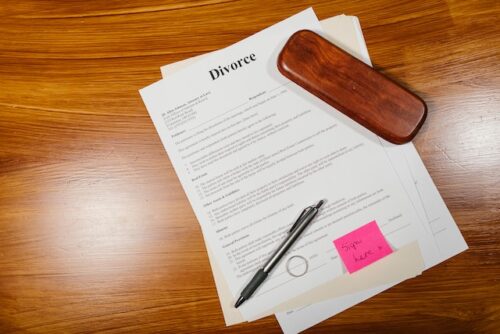 divorce papers and ring