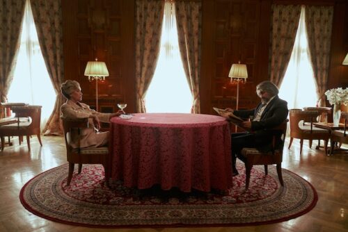 wealthy couple at table