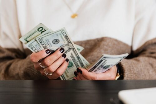 woman counting cash