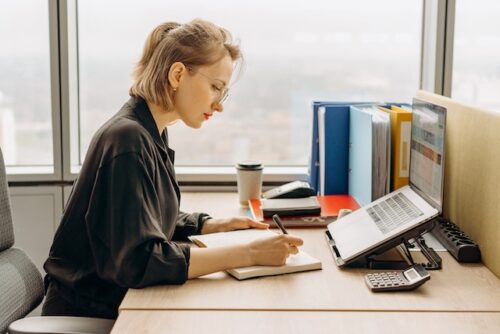 woman sitting at desk