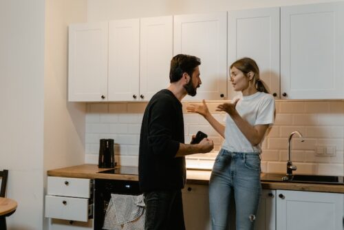 couple in kitchen arguing