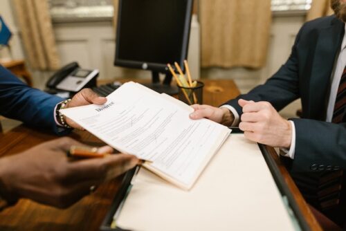 lawyer showing man divorce papers