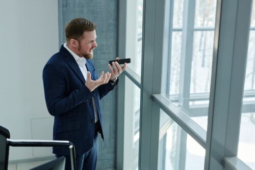 angry man yelling on phone